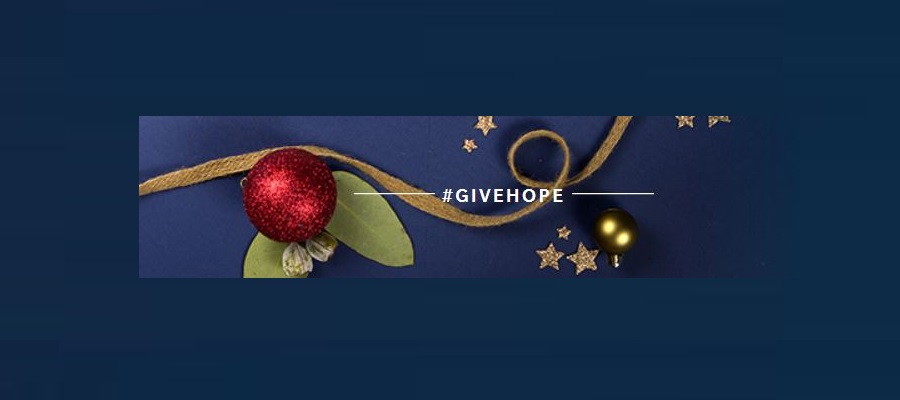 Image of Christmas decorations with the words #GIVEHOPE